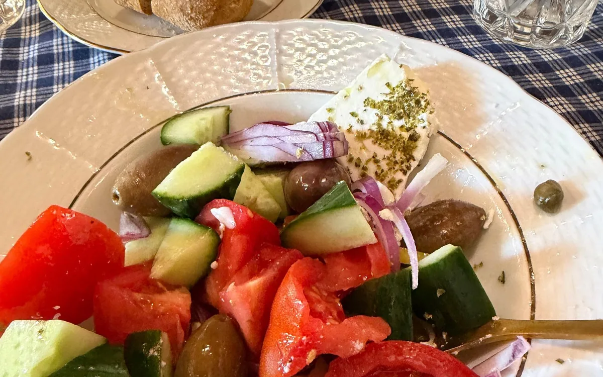 A Greek salad with feta, olives, cucumber and tomato, from the class listing